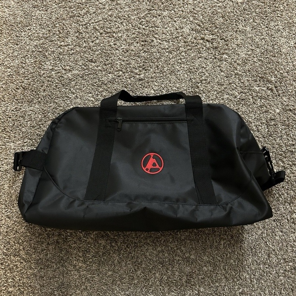 Black Duffel Bag with Red Logo